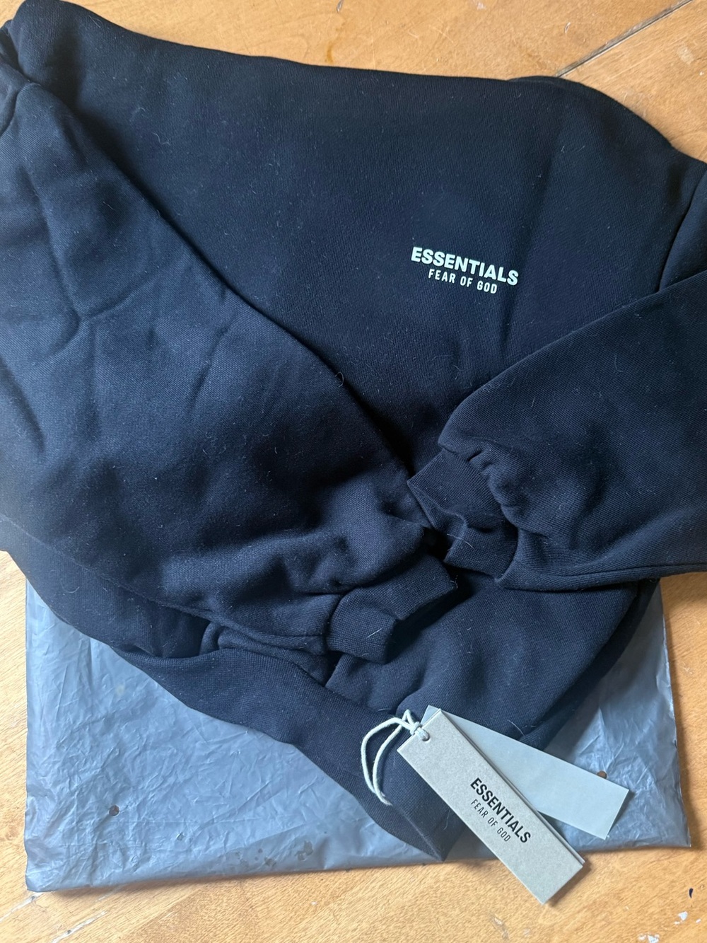 Fear of God ESSENTIALS Black Pullover Hoodie with Chest Logo
